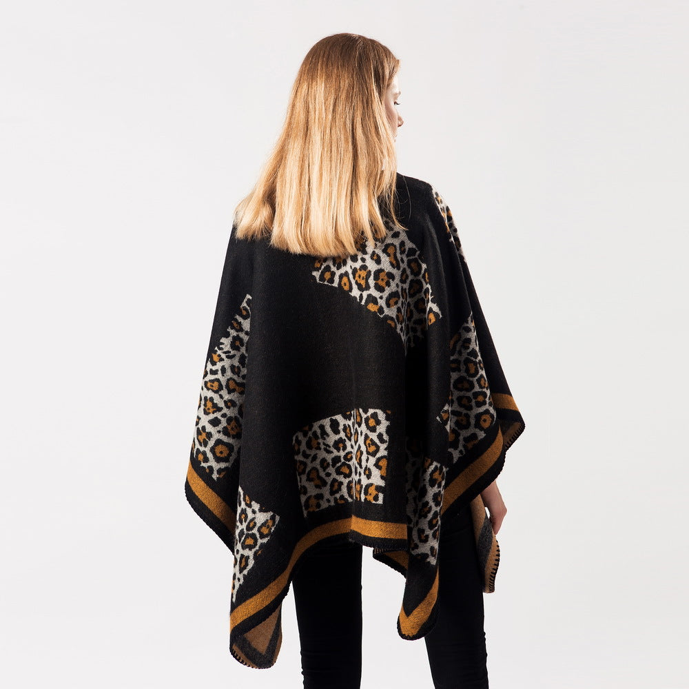 Black leopard-print cashmere shawl from back view with tan-trim border