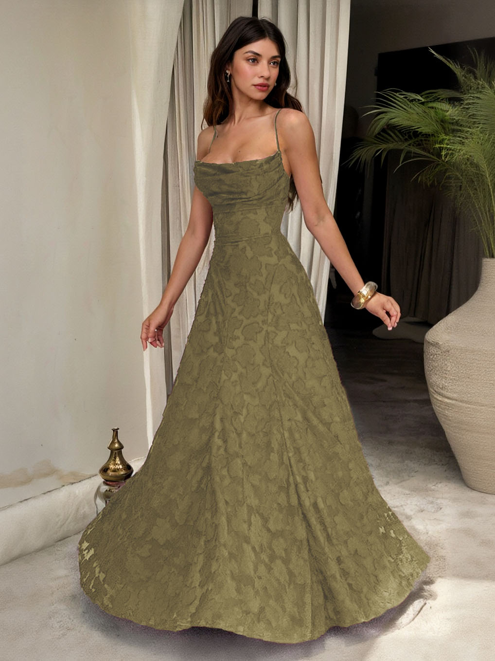 Olive green spaghetti-strap maxi dress with fitted bodice and flared skirt