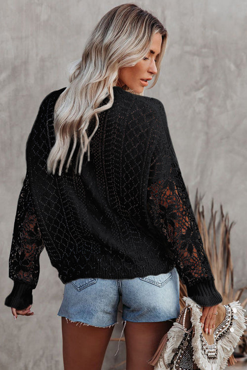 Black lace hollow-out knit sweater with long sleeves and subtle diamond texture