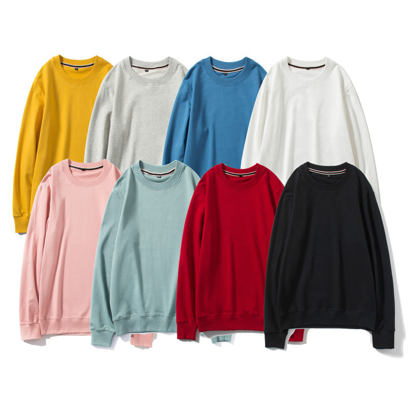 Assorted round-neck cotton sweaters in multiple colors, long-sleeve pullover styles