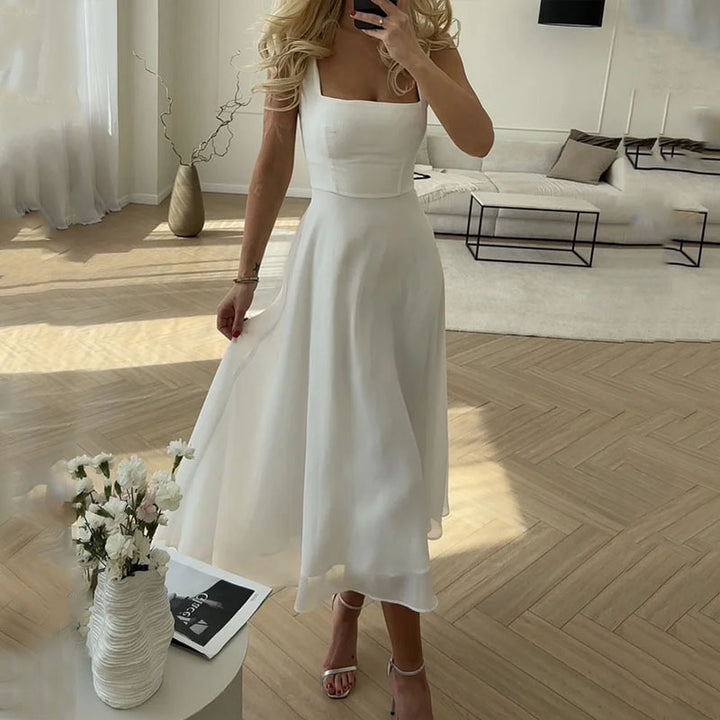 White square-neck midi dress with sleeveless bodice and flared skirt