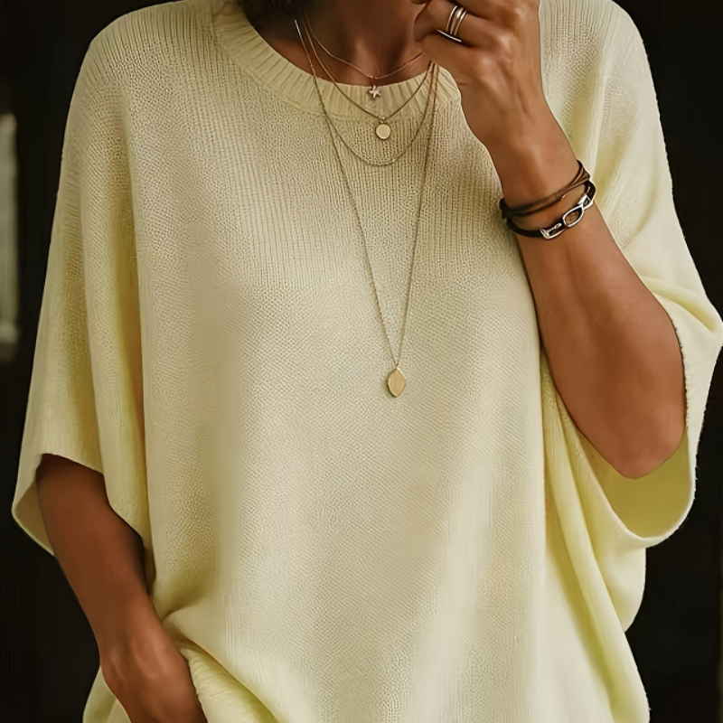 Women’s cropped knit pullover, short sleeves, pointelle texture, pale yellow