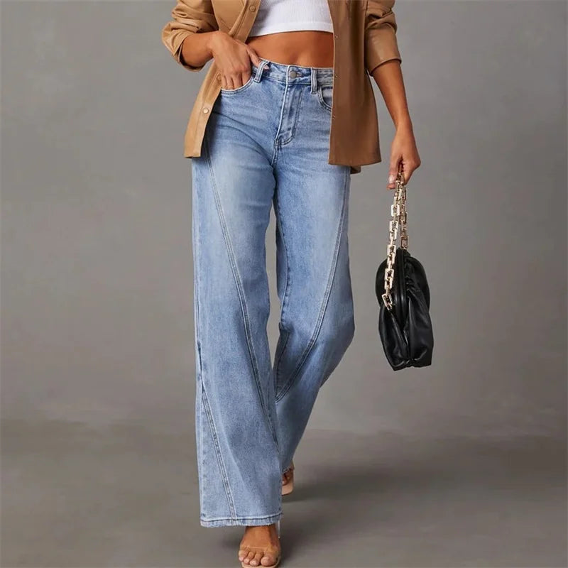 Women's high-rise blue flare jeans with front yoke seams and long flare legs