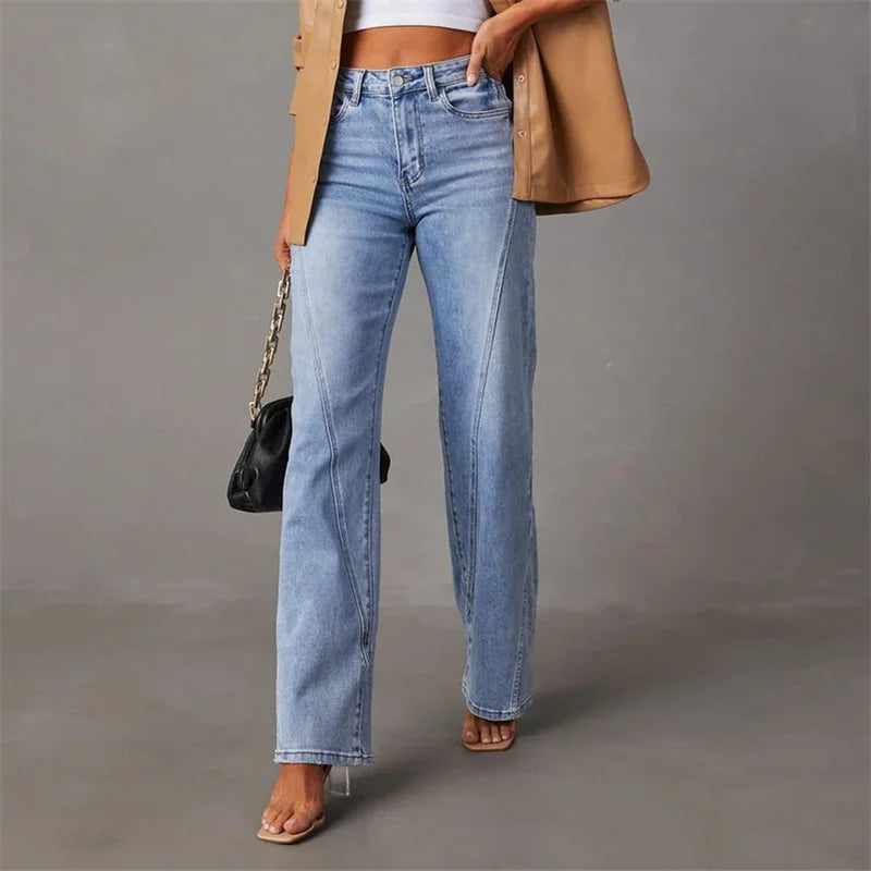 Women's high-rise blue flare jeans with classic five-pocket styling, medium wash