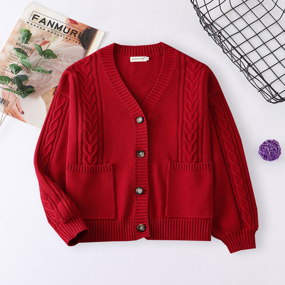 Women's red cable-knit V-neck button cardigan with patch pockets