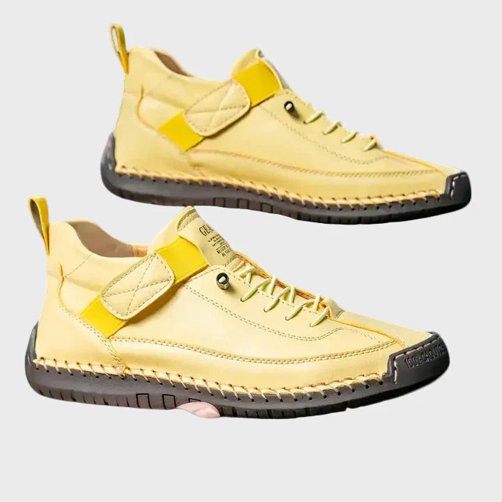Yellow faux leather lace-up sneakers with ankle strap and black rubber sole
