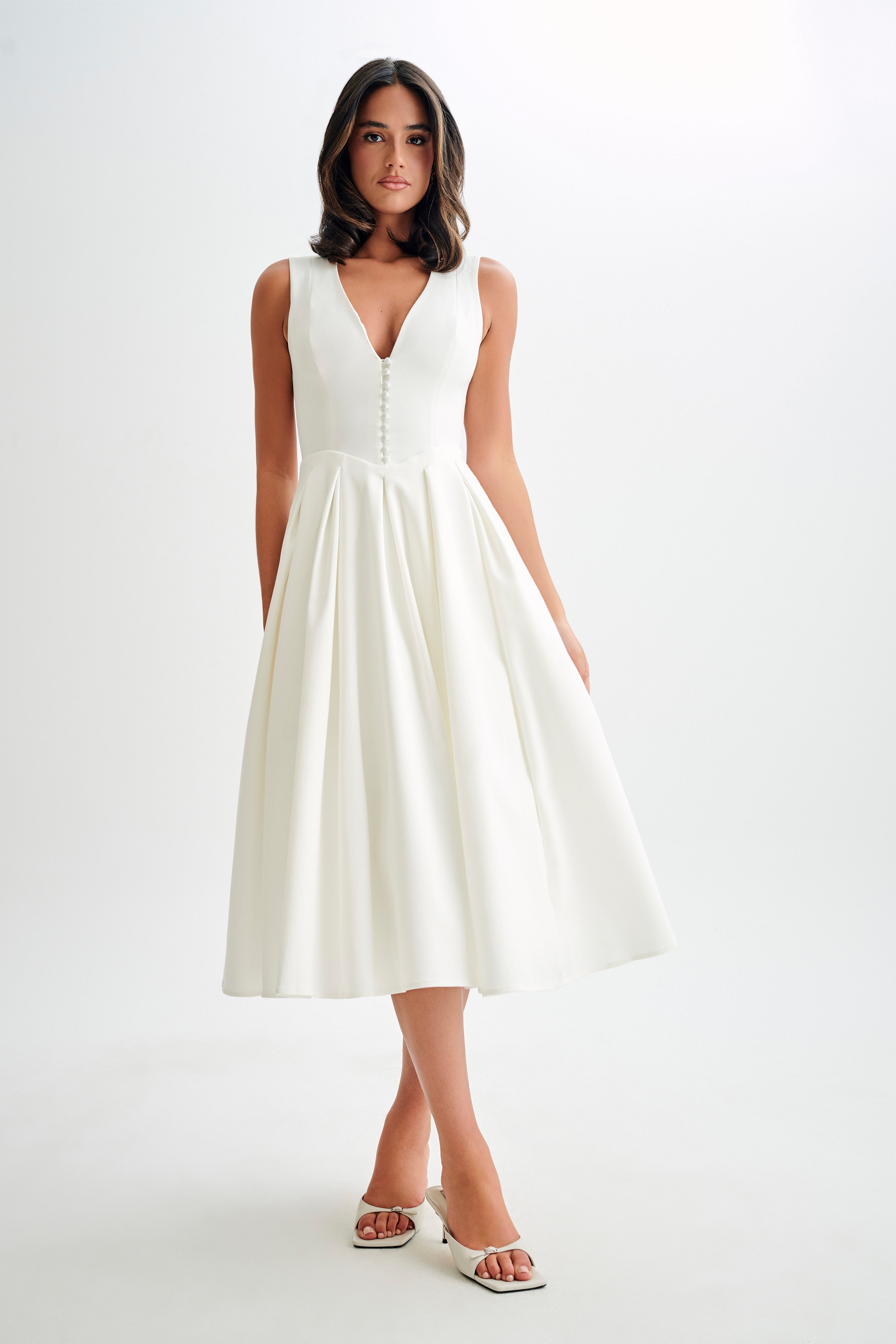 White satin A-line midi dress, sleeveless deep V front with button placket