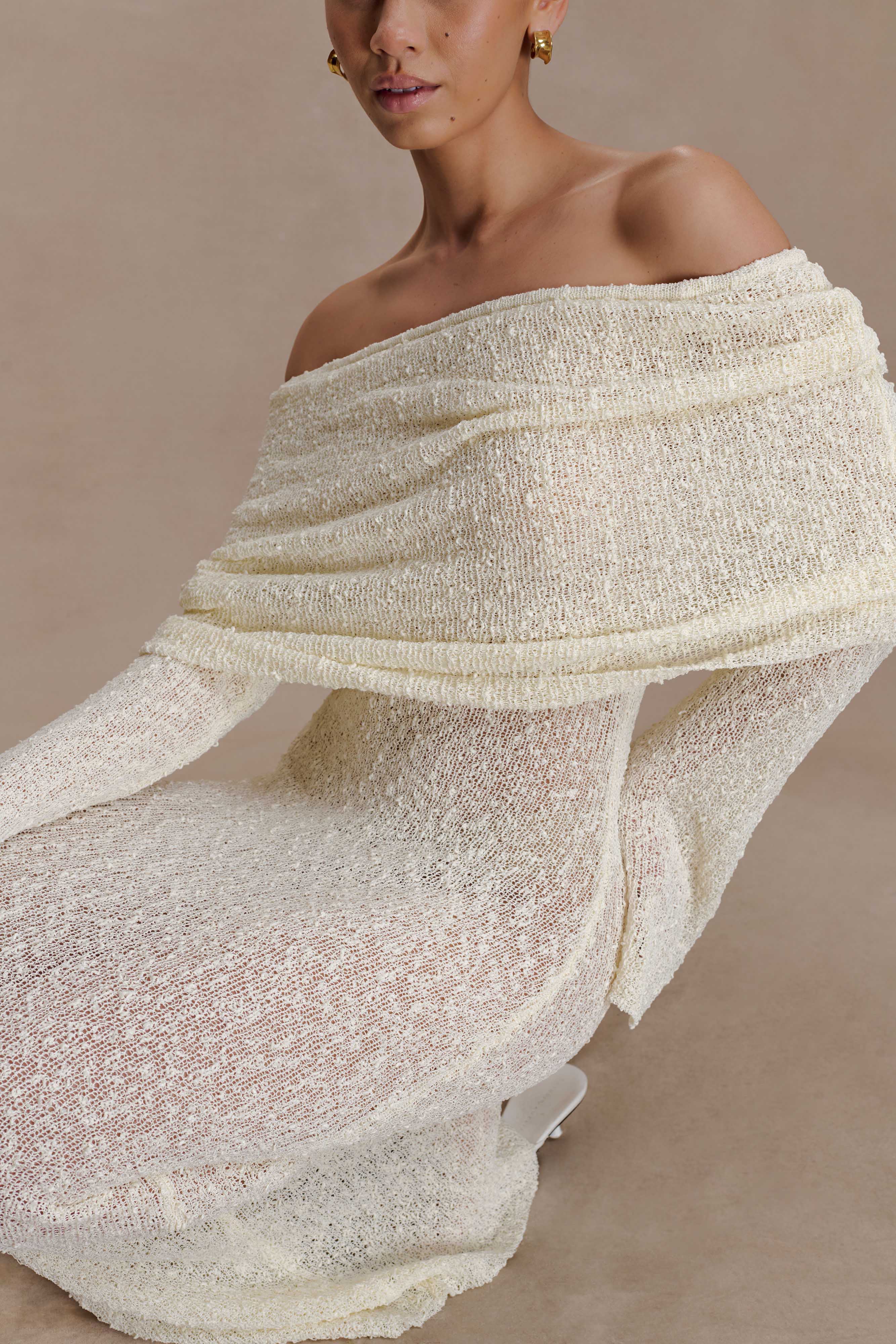 Off-shoulder knit maxi dress detail with wide foldover neckline and long sleeves