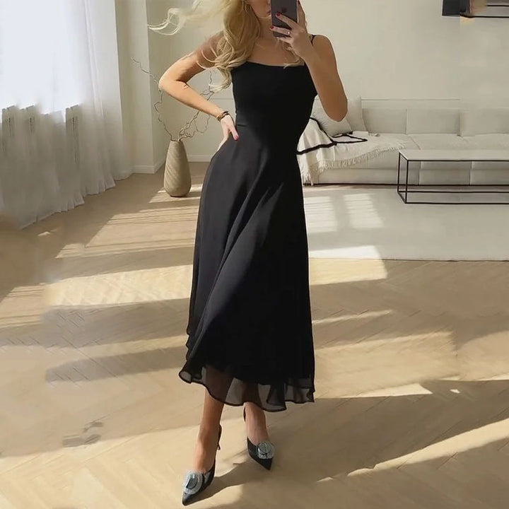 Black square-neck midi dress, sleeveless fitted bodice and flowing A-line skirt