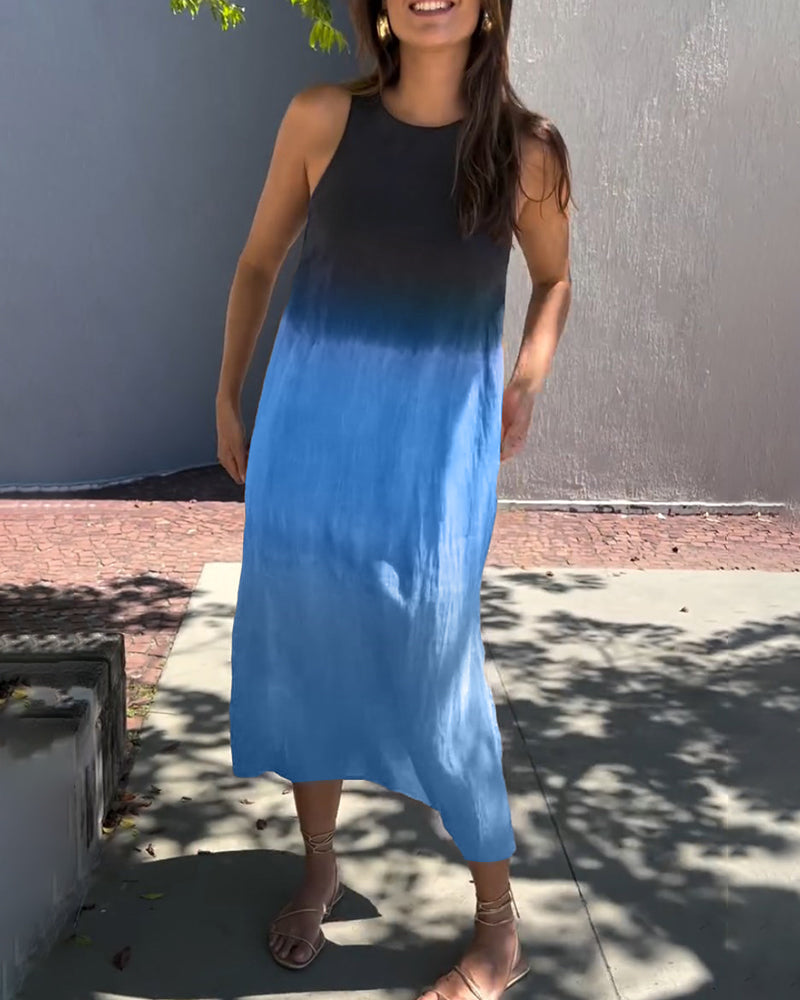 Sleeveless viscose ombre midi dress with crew neck and side slit, dark-to-blue gradient.