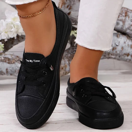 Women's black chunky platform lace-up sneakers with thick sole