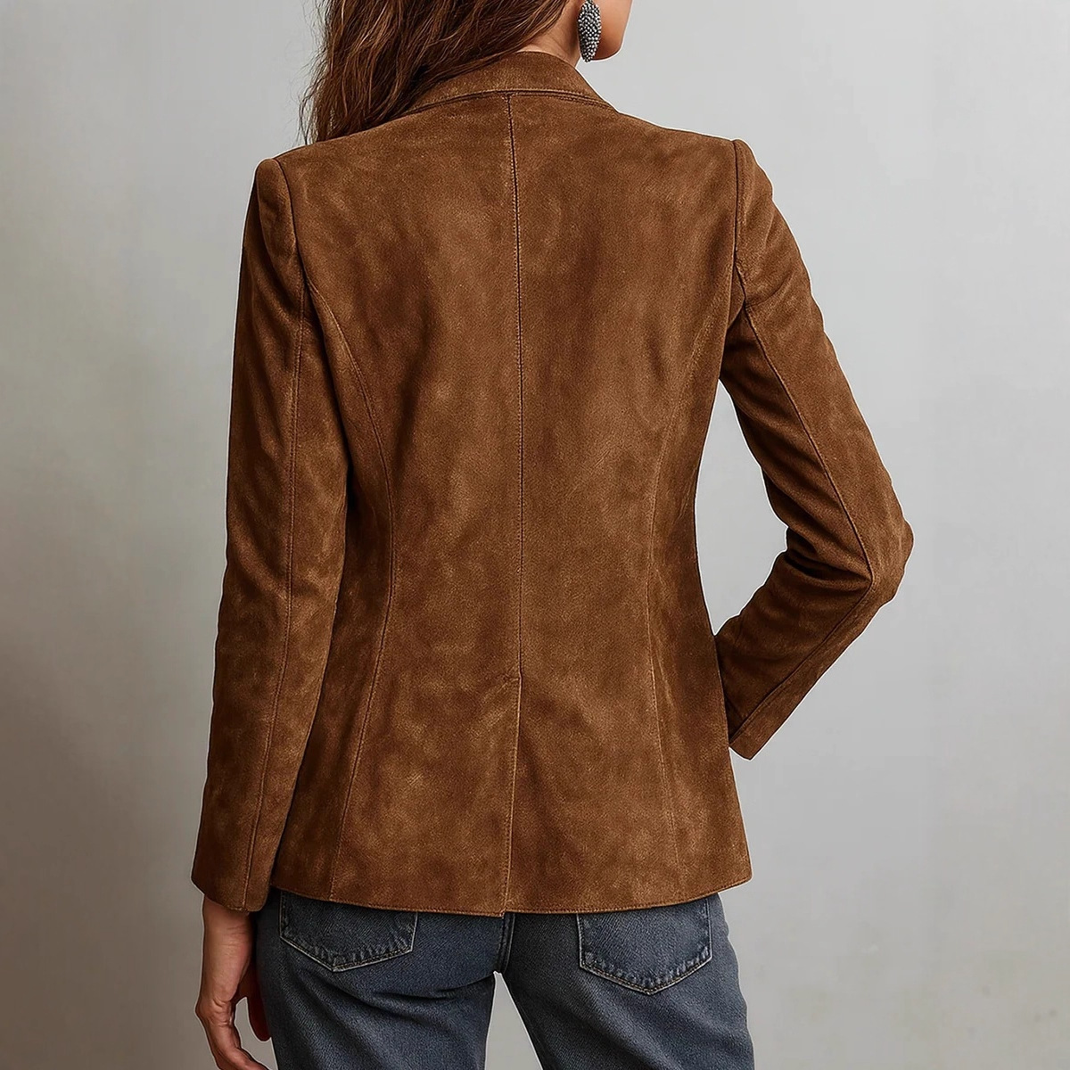 Women’s blazer back view, brown suede with long sleeves and stitched seam details