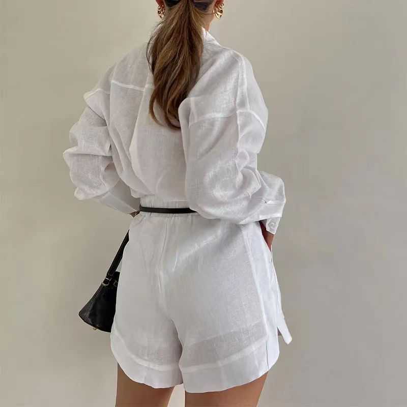 White linen button shirt and high-waist belted shorts set, back view