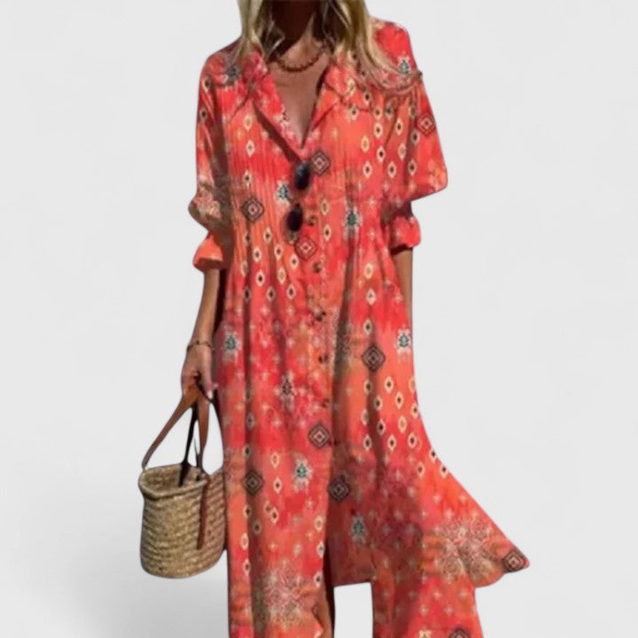 Boho printed maxi dress in coral red with intricate geometric pattern, V-neck button front