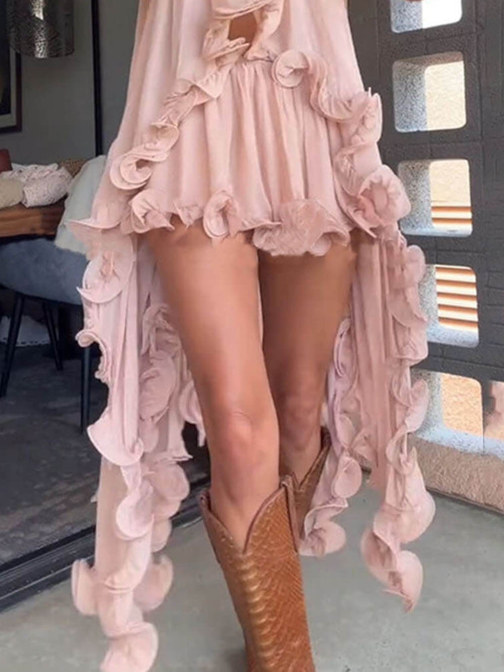 Pink chiffon ruffle mini skirt with 3D floral appliqué and asymmetrical hem