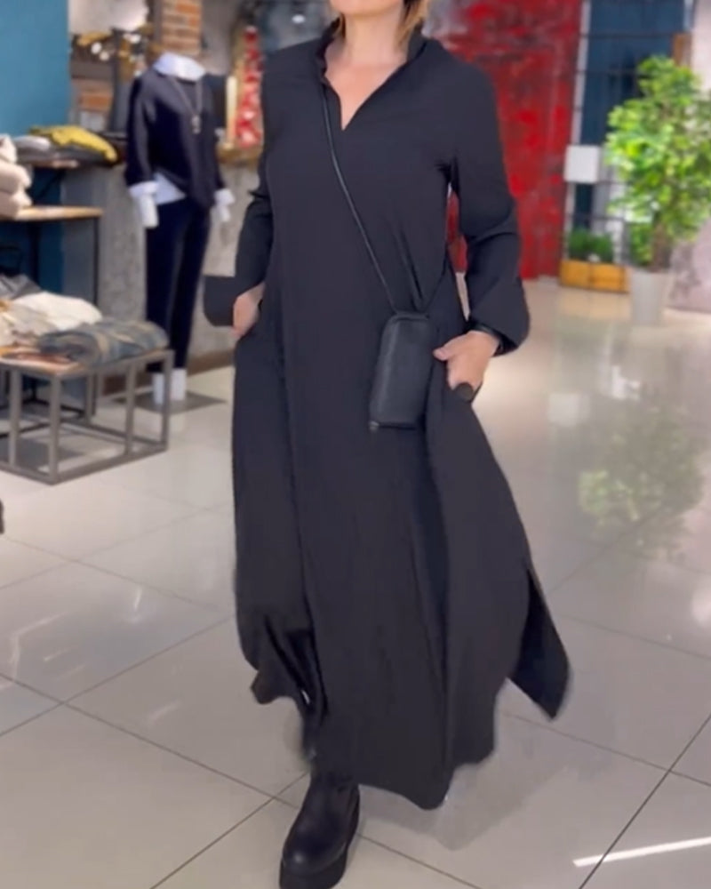 Black long-sleeve maxi dress with stand collar and side pockets, loose fit