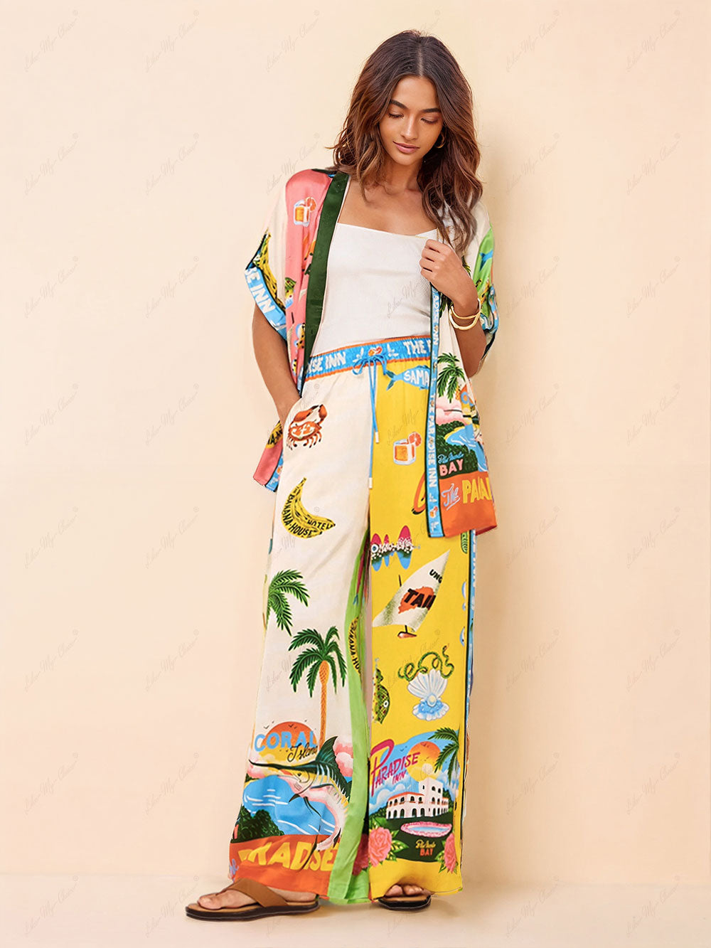 Relaxed satin shirt with tropical multicolor print and open front, draped fit