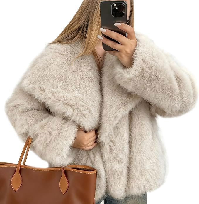 Cream faux fur jacket with a wide collar and long sleeves
