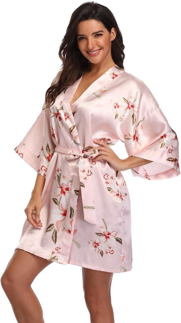 Pale pink satin robe with a delicate floral print and waist tie