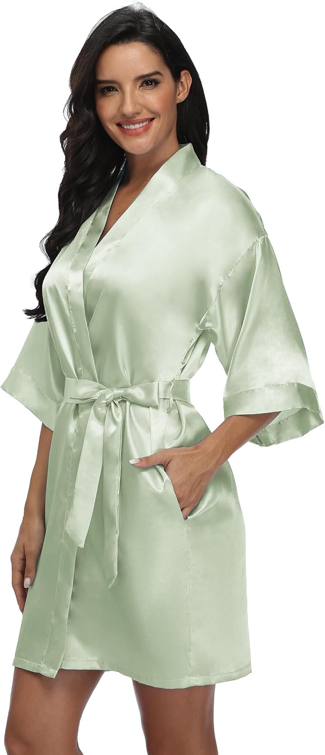 Short pale green satin robe with wide sleeves, pockets, and a matching tie belt