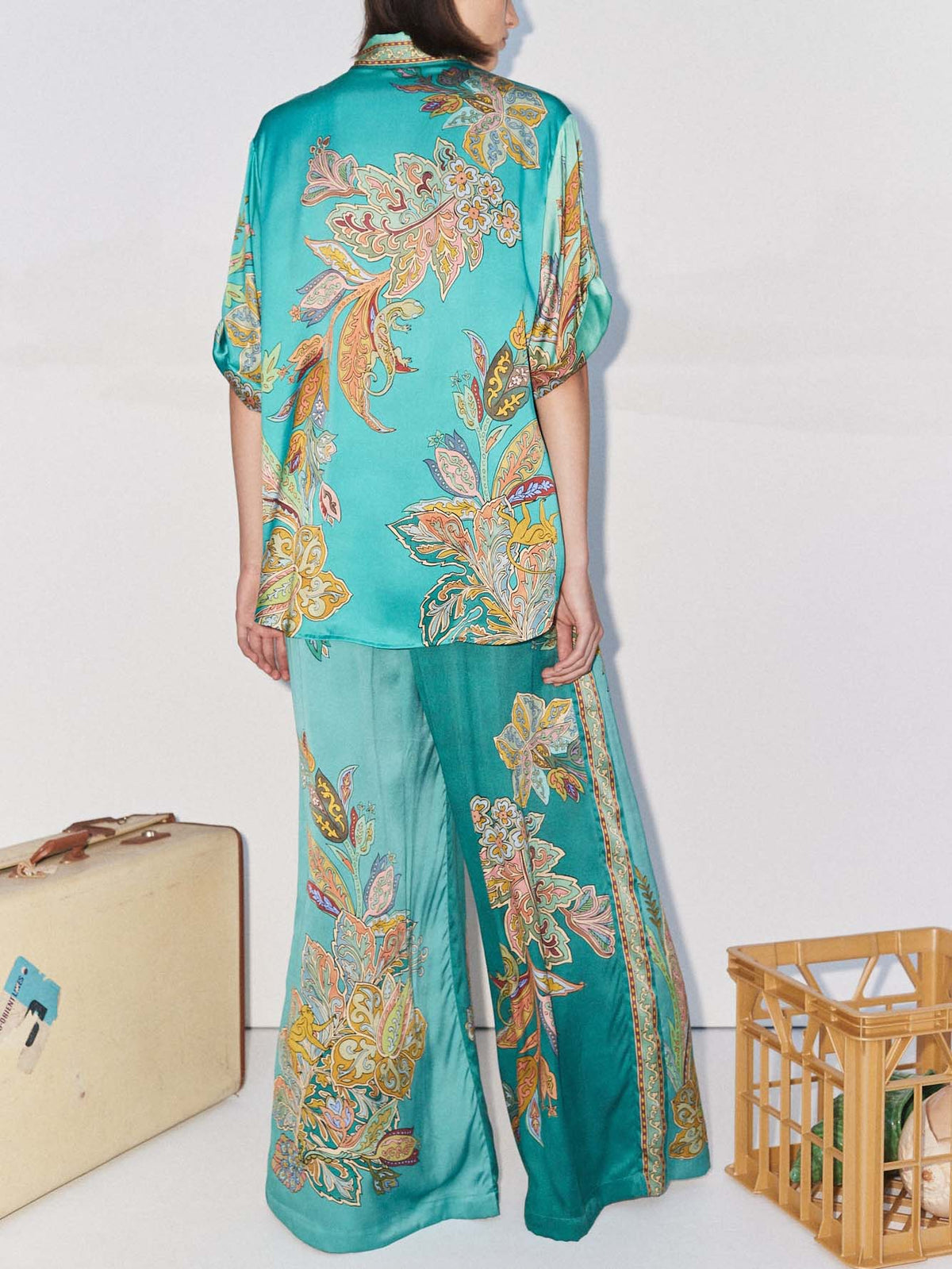 Women’s satin blouse with turquoise botanical paisley print and relaxed wide-leg pants