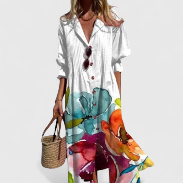 Boho printed maxi dress in white with teal, orange, and pink floral print, button front