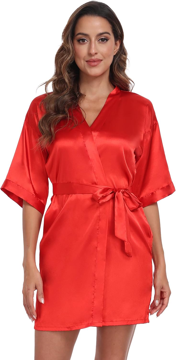 Short red satin robe with wide sleeves, pockets, and a matching tie belt