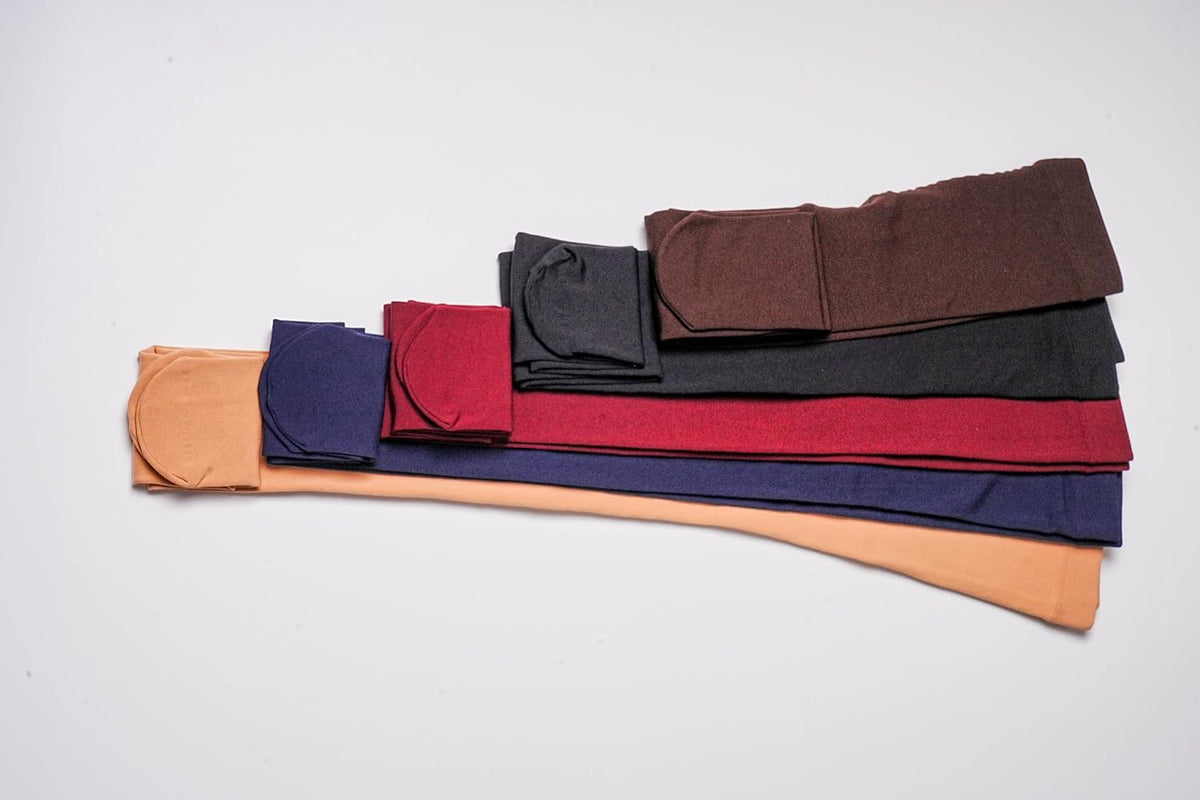 Folded thermal tights in assorted colors: nude, black, brown, navy, wine red