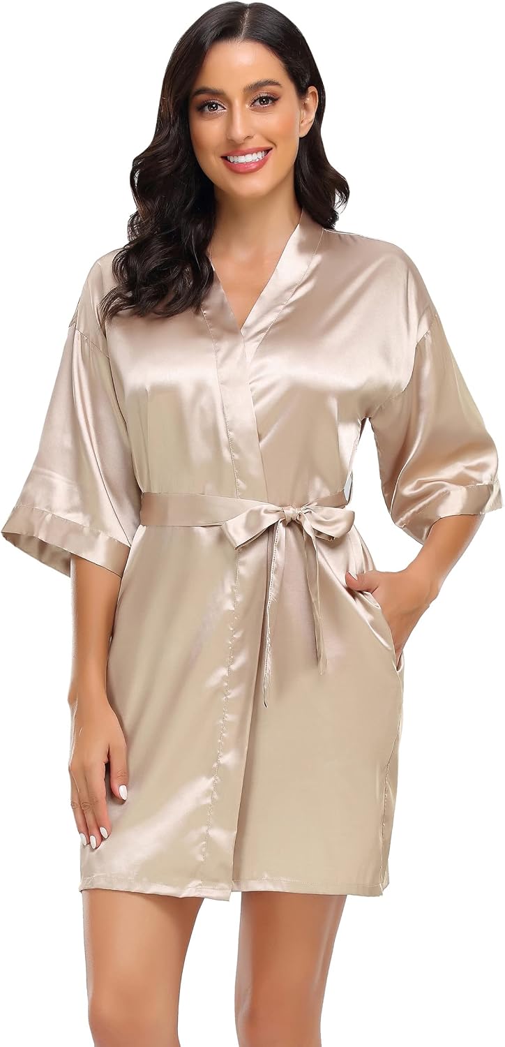 Short champagne satin robe with wide sleeves, pockets, and a matching tie belt