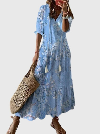 Light blue boho summer dress with short sleeves and floral print, tiered skirt