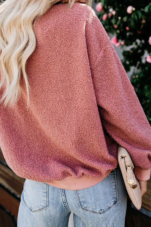 Rose teddy long-sleeve top with fuzzy texture and slightly dropped shoulder