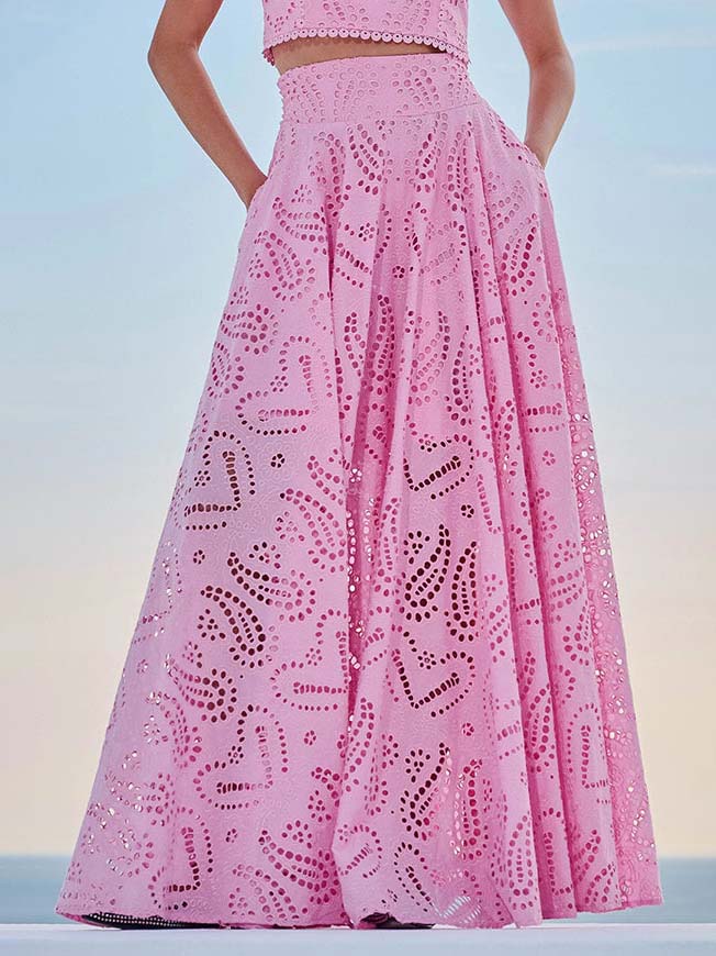 Pink eyelet lace high-waist maxi skirt, full A-line flare with repeating cutout pattern