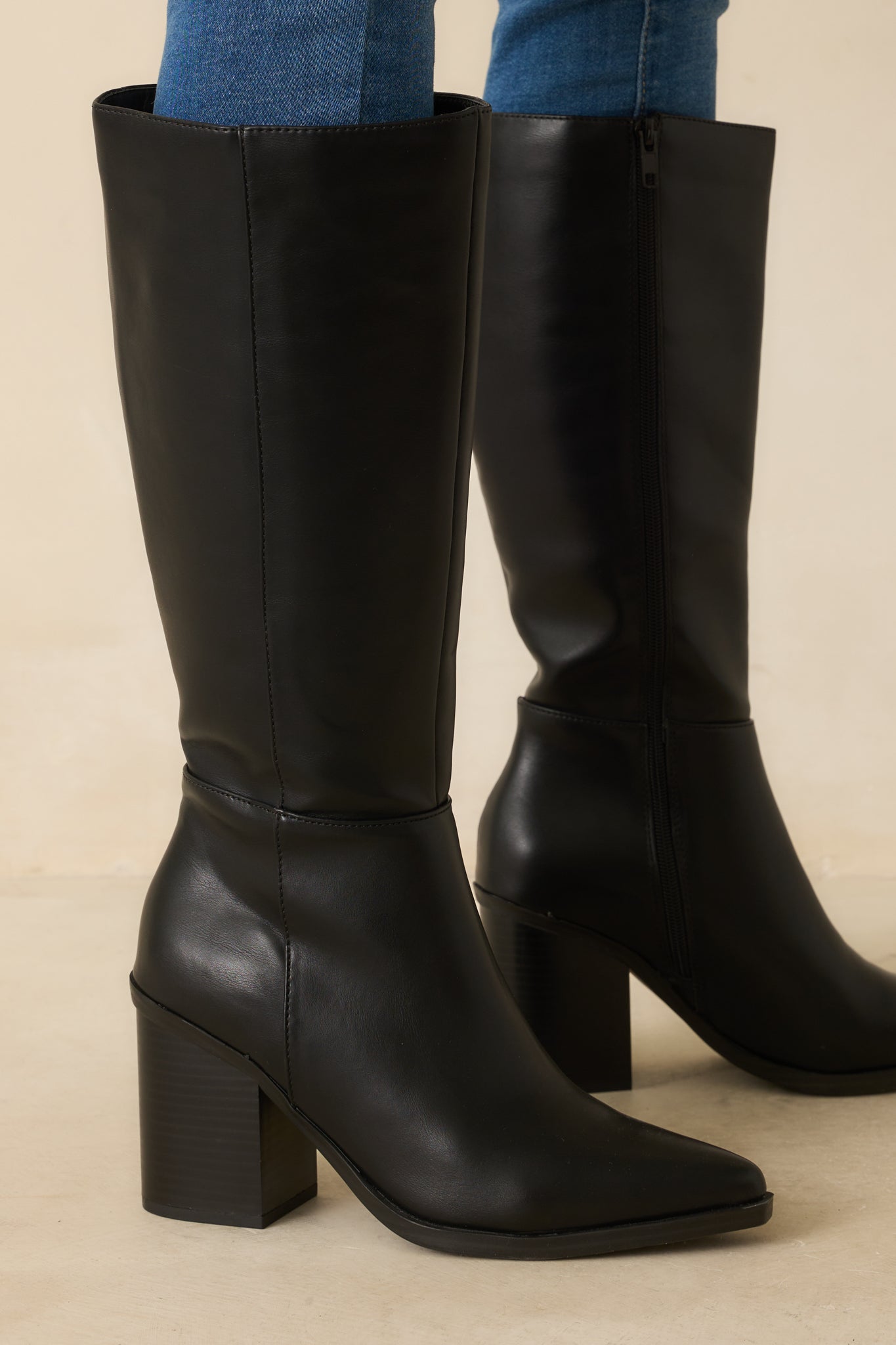 Black knee-high faux leather pull-on boots with block heel