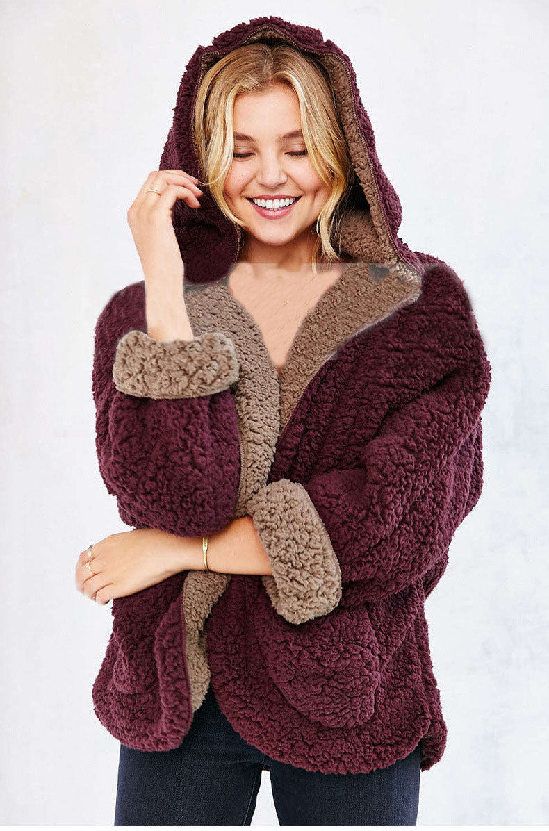 Burgundy sherpa hooded jacket with tan fleece hood and open front, plush texture