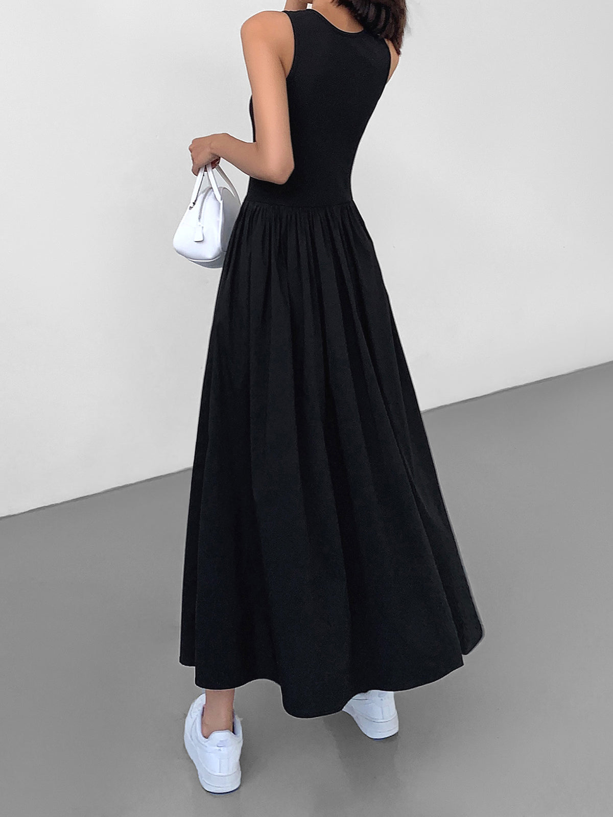 Black cotton sleeveless midi dress with ribbed bodice and gathered full skirt