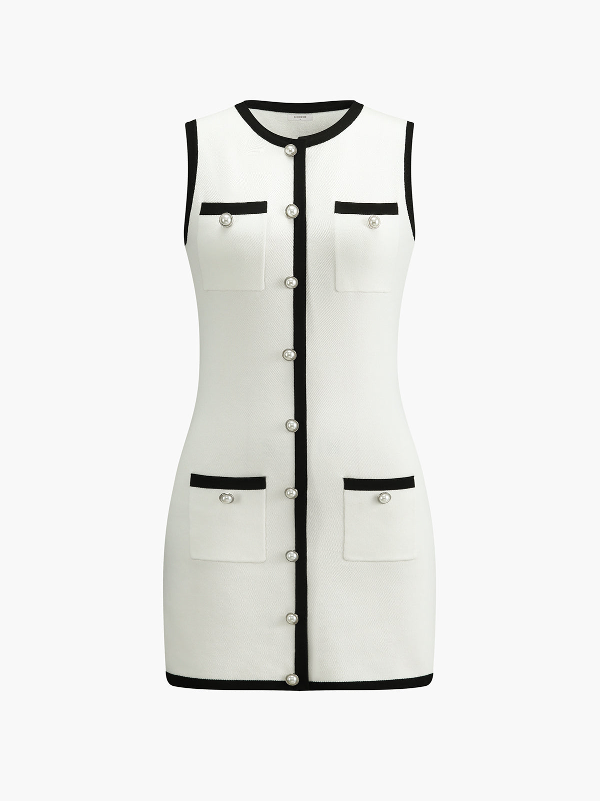 White sleeveless knit mini dress with black contrast trim, pearl buttons, and flap chest pockets