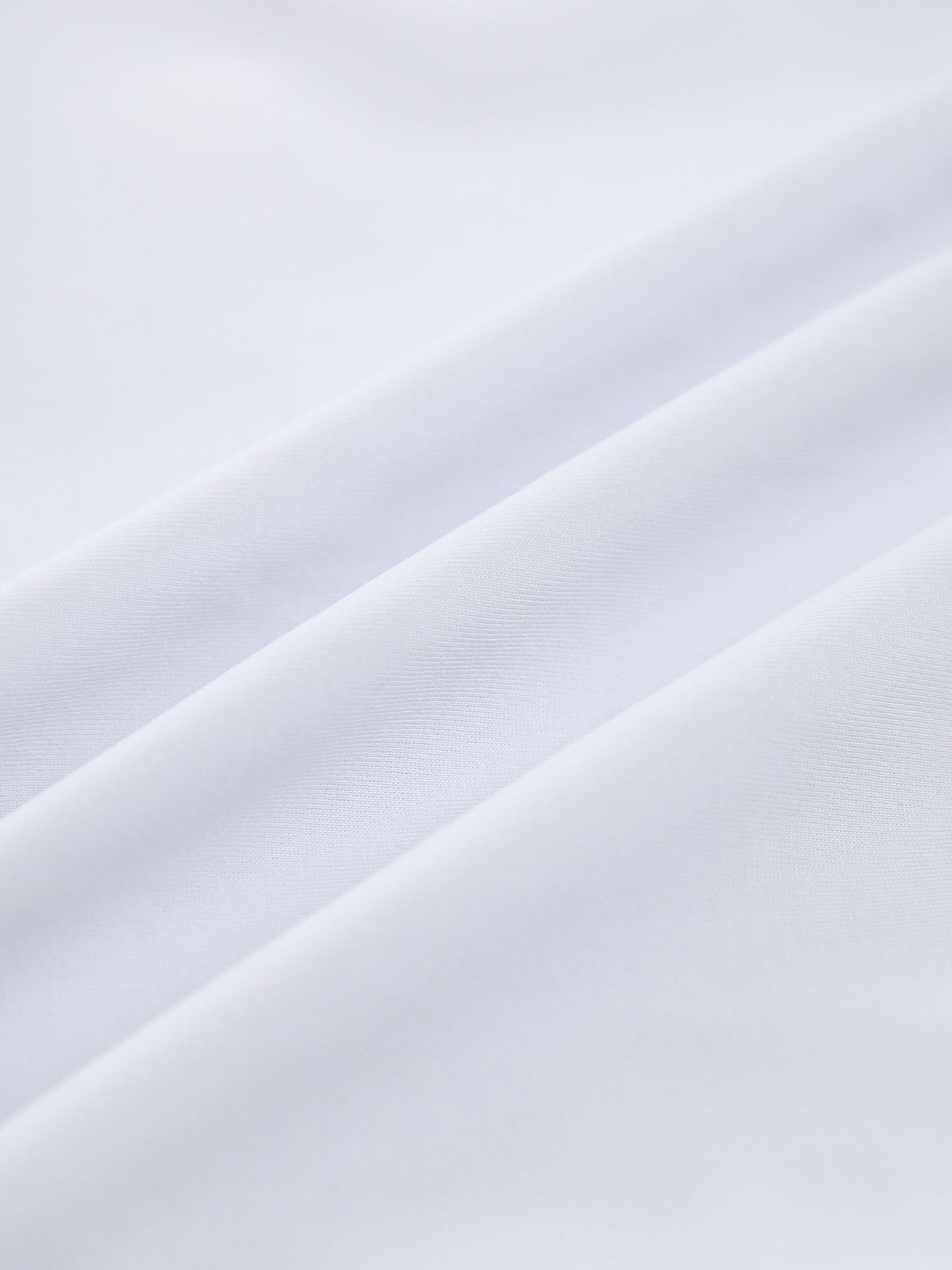 White stretch nylon fabric close-up with smooth woven texture
