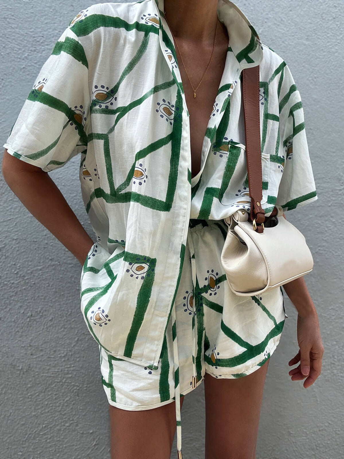 Printed short-sleeve button shirt and matching shorts set, white with green motif stripe print