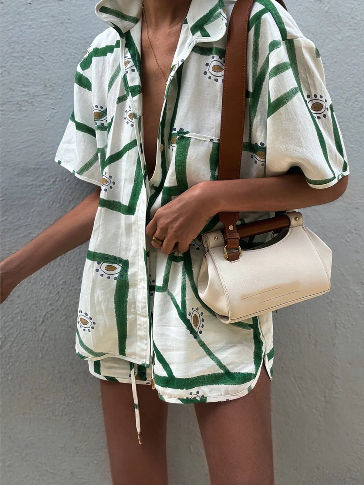 Printed short-sleeve button shirt and matching drawstring shorts, white with green motifs