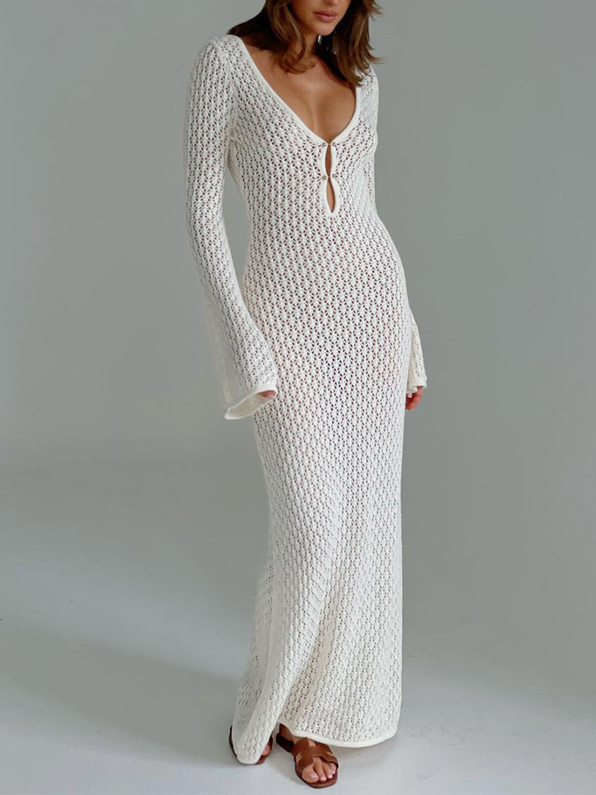 White crochet maxi dress with long sleeves and deep V keyhole front