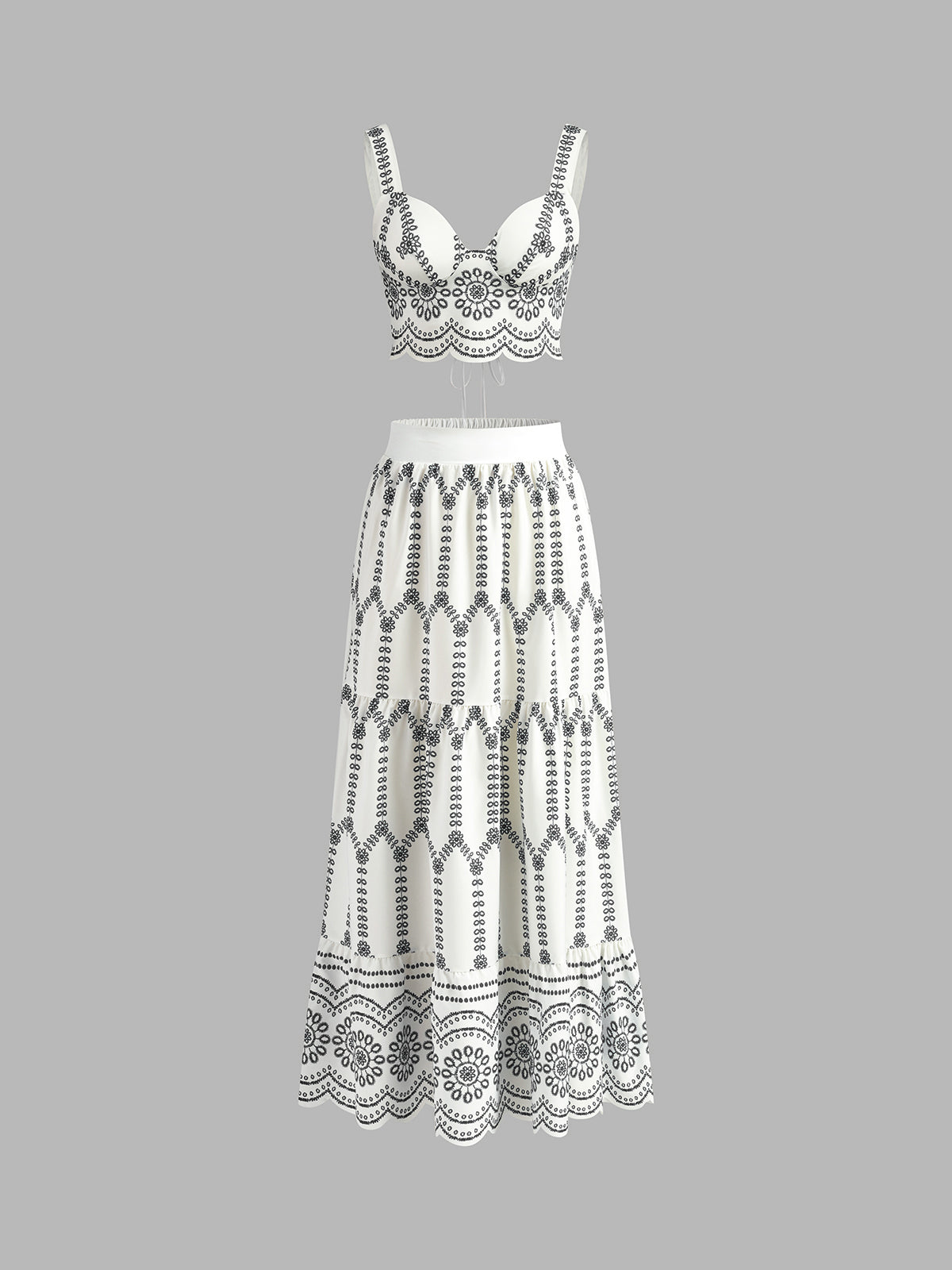 Black-and-white embroidered linen bustier and maxi skirt set with scalloped trim