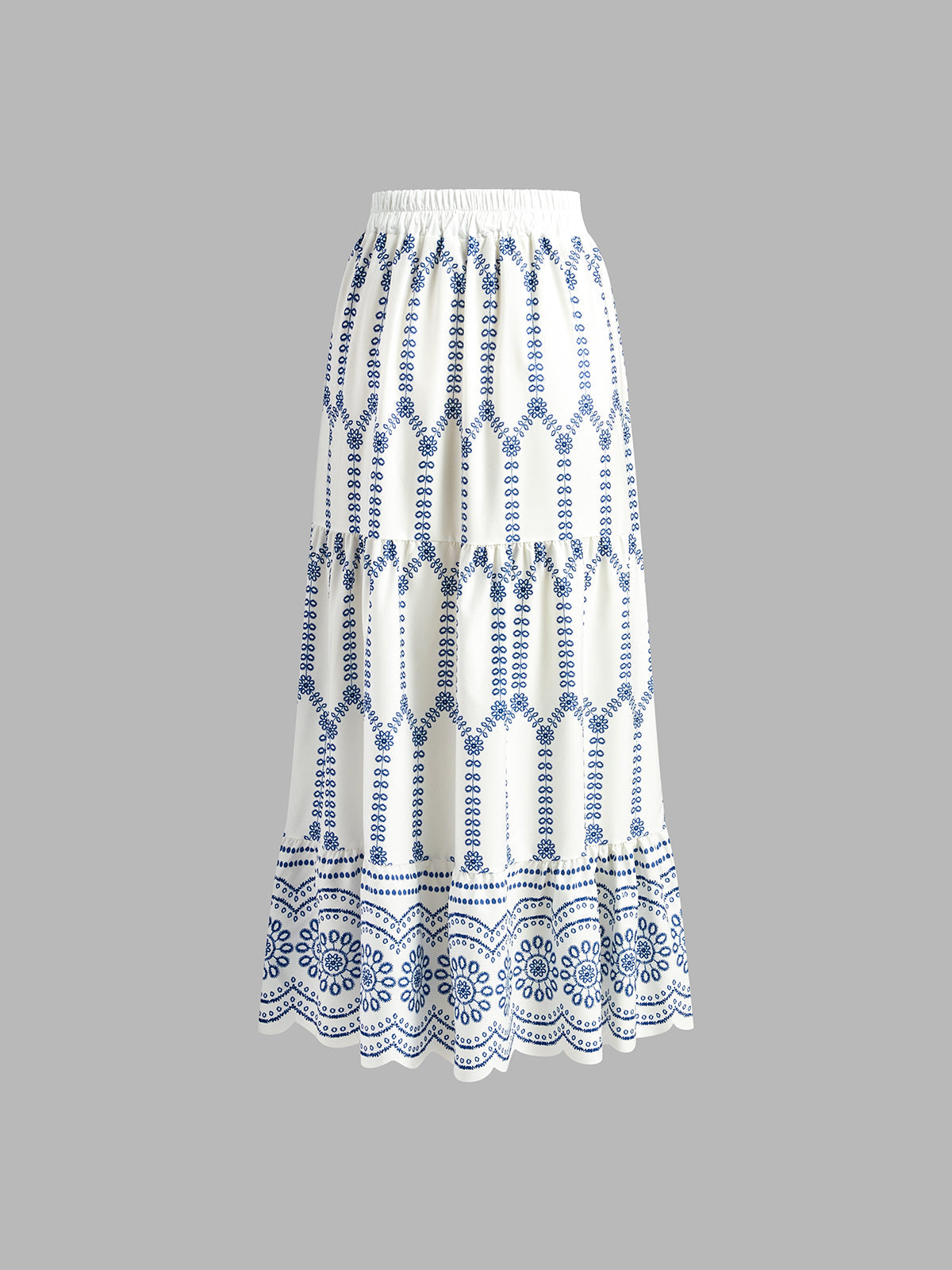 Blue-and-white embroidered linen maxi skirt with vertical stripe panels and lace hem