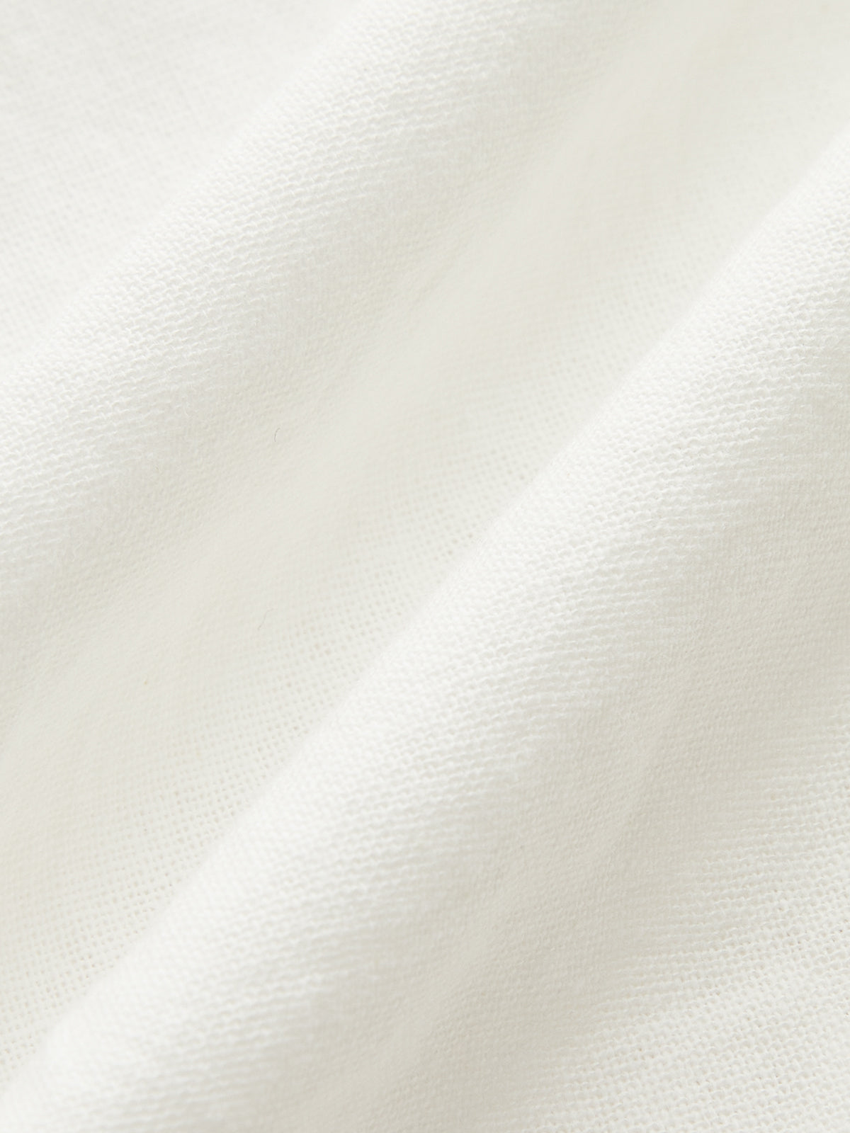 White linen fabric with fine woven texture
