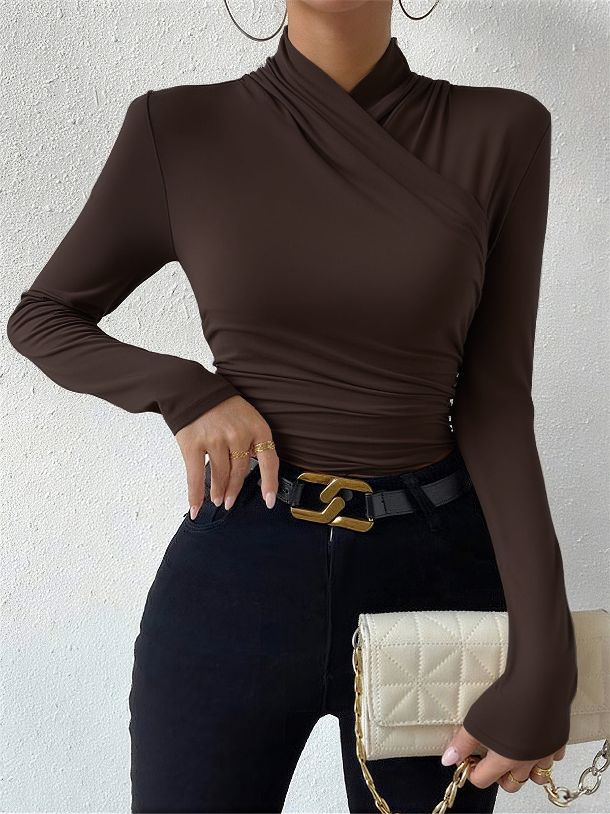 Brown mock neck long-sleeve wrap top with ruched waist crossover front