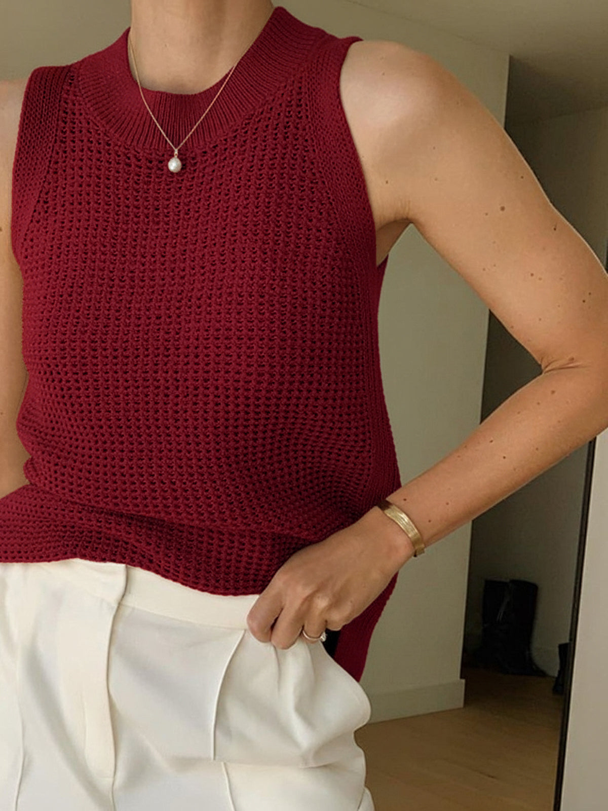 Burgundy open-knit cotton sleeveless tank top with ribbed crew neckline and crochet texture