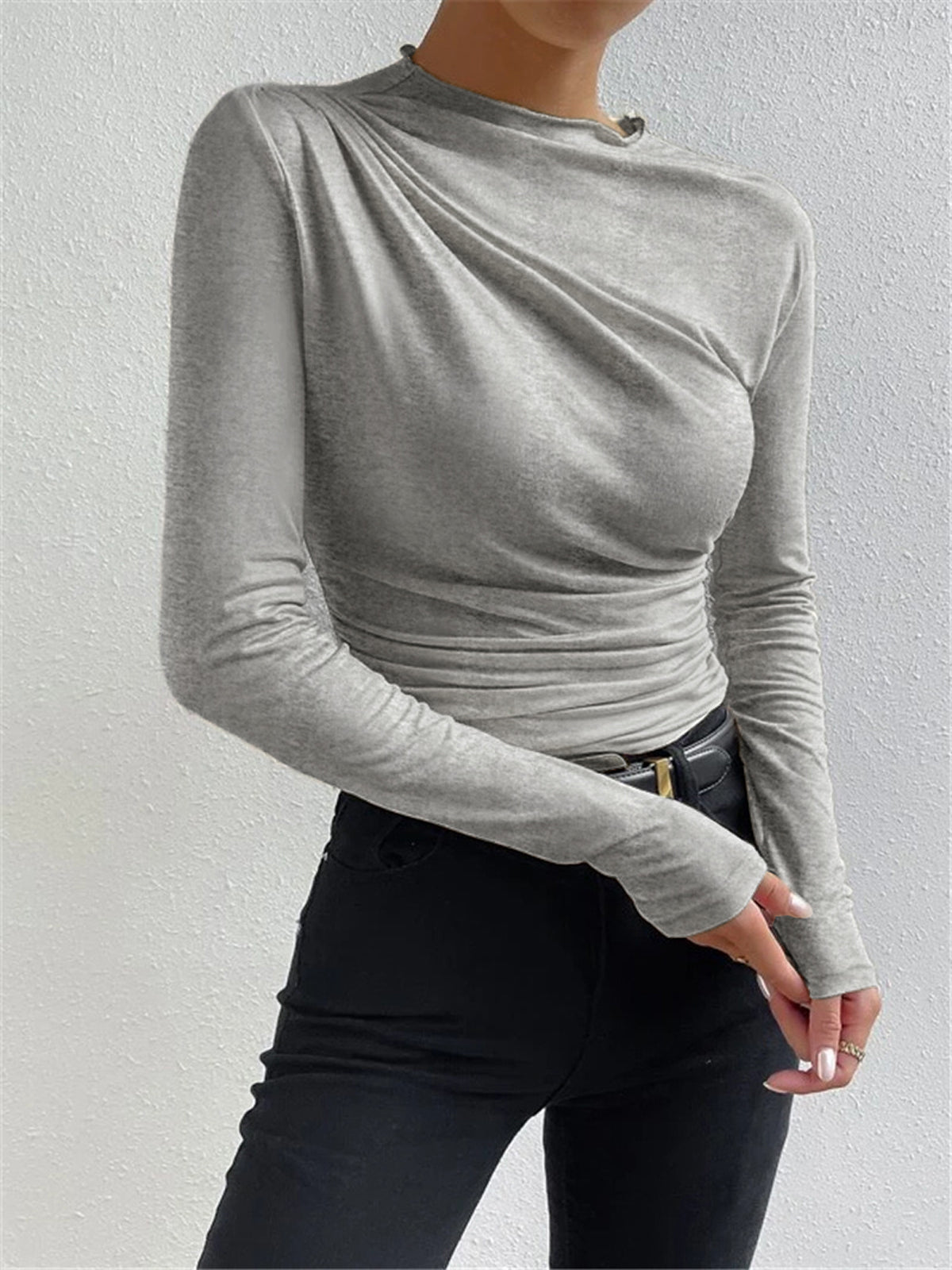 Light grey long-sleeve ruched top with draped neckline detail at front