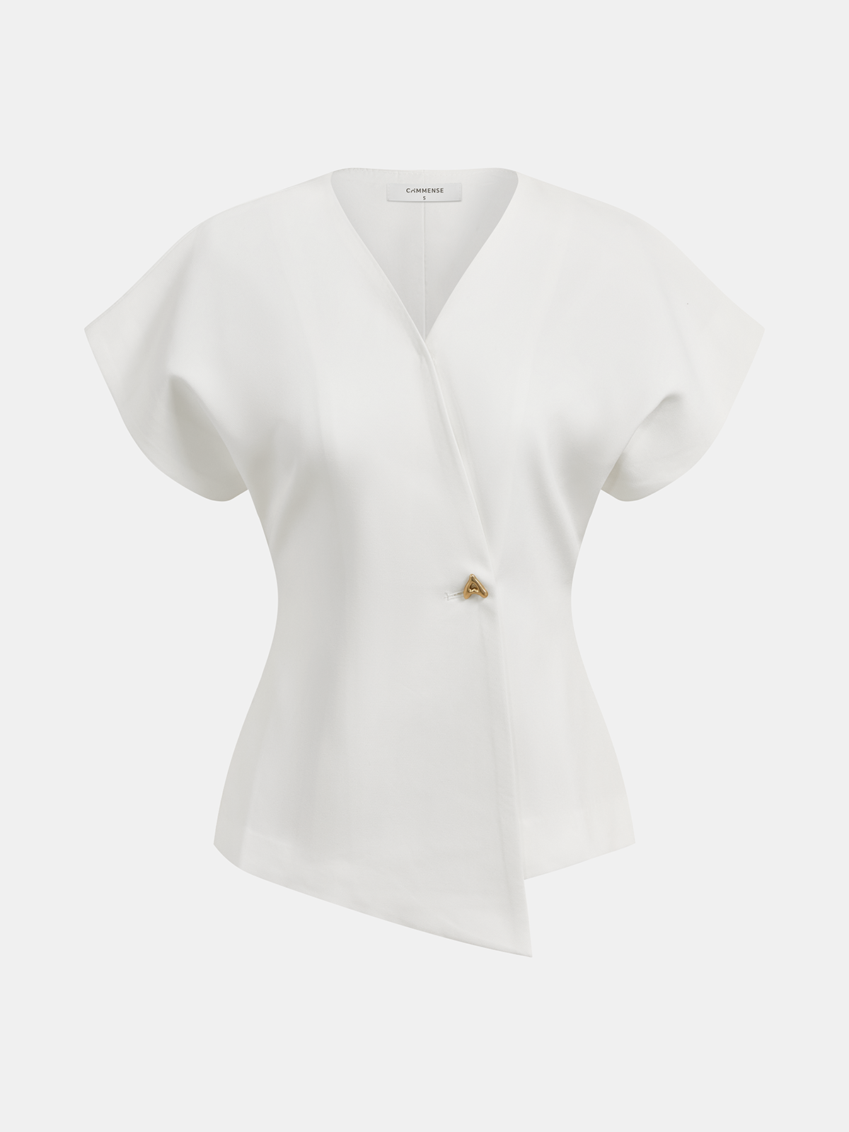 White crepe blouse on mannequin with V-neck, cap sleeves, asymmetric gold button