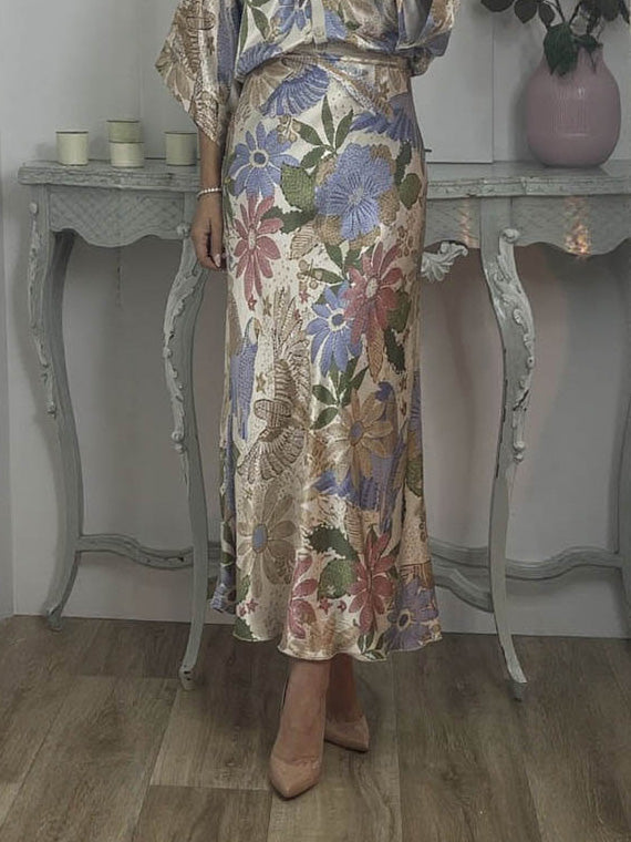 Floral satin midi skirt in cream with multicolor flowers and high-waist bias drape