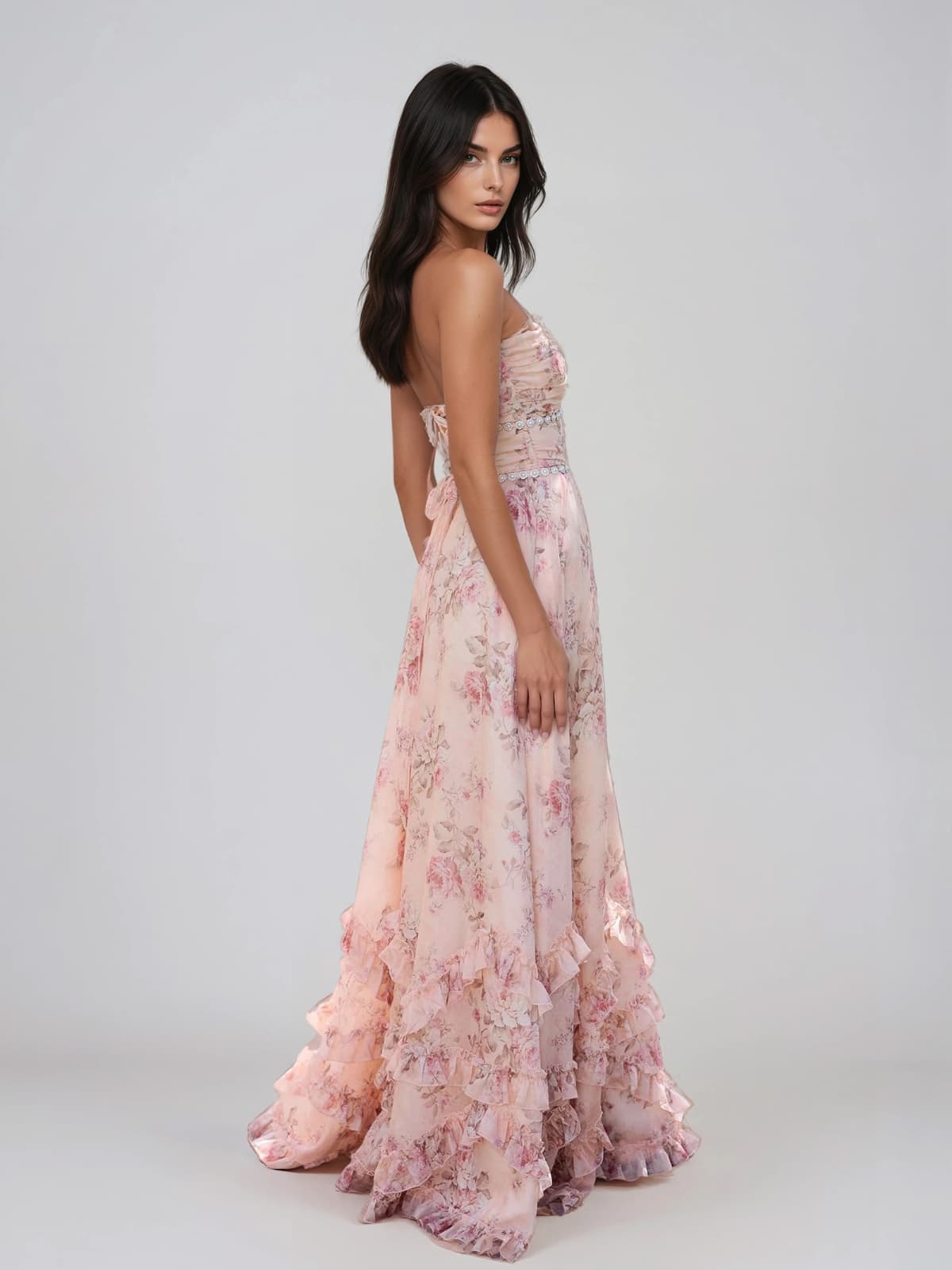 Pink floral plunge maxi dress with thin straps and layered ruffles along the skirt