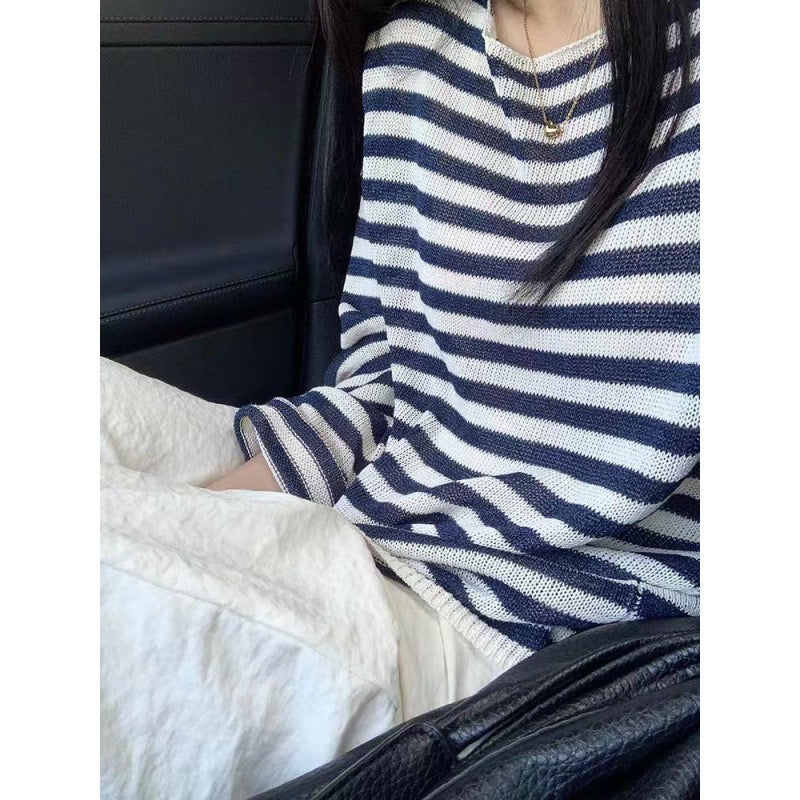 Women’s striped oversized sweater with wide round neck, navy and white stripes, draped fit